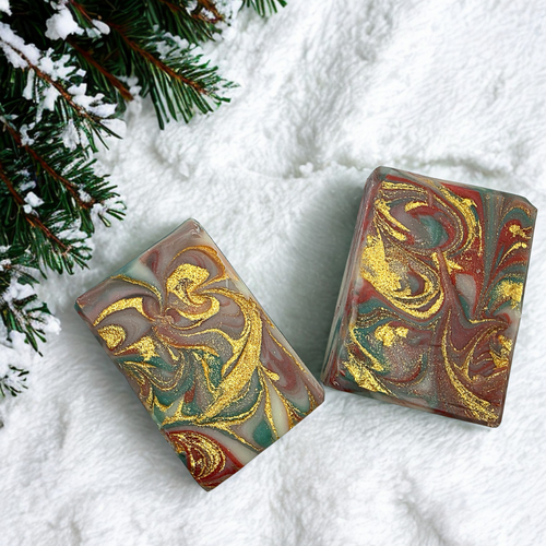 Holiday Cabin Soap featuring two bars of soap against snowy backdrop