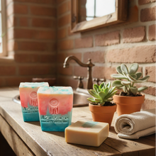 three  bars of soap on wooden countertop of bathroom